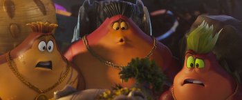 Movie still from “Under the Boardwalk” (2023), directed by David Soren – A person's face with a plant in front of it; Close Up shot, High angle