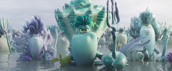 Movie still from “Under the Boardwalk” (2023), directed by David Soren – An image of an animated character in the water; Medium shot, Low angle
