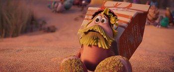 Movie still from “Under the Boardwalk” (2023), directed by David Soren – A character sitting on the ground with a beard and a mustache; Close Up shot, High angle