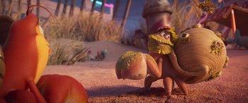 Movie still from “Under the Boardwalk” (2023), directed by David Soren – An image of an animated character in a desert setting; Wide shot, Over the shoulder angle