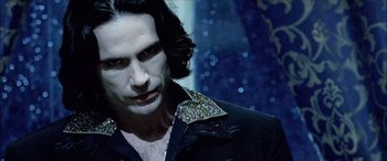 Movie still from “Underworld” (2003), directed by Len Wiseman – A person with long hair; Close Up shot, Low angle