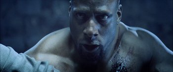 Movie still from “Underworld” (2003), directed by Len Wiseman – A person with a face covered in blood; Close Up shot, High angle