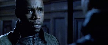 Movie still from “Underworld” (2003), directed by Len Wiseman – A person wearing a jacket; Close Up shot, Low angle
