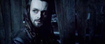 Movie still from “Underworld” (2003), directed by Len Wiseman – A person with a beard; Close Up shot, Low angle