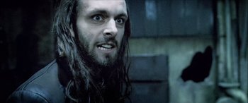 Movie still from “Underworld” (2003), directed by Len Wiseman – A person with long hair; Close Up shot, Low angle
