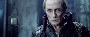 Movie still from “Underworld” (2003), directed by Len Wiseman – A person wearing a costume; Close Up shot, Low angle