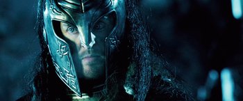 Movie still from “Underworld: Evolution” (2006), directed by Len Wiseman – A person wearing a helmet; Close Up shot, Over the shoulder angle