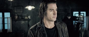 Movie still from “Underworld: Evolution” (2006), directed by Len Wiseman – A person with long hair; Close Up shot, Low angle