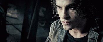 Movie still from “Underworld: Evolution” (2006), directed by Len Wiseman – A person with long hair; Close Up shot, Low angle