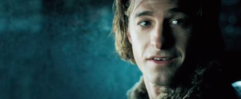 Movie still from “Underworld: Evolution” (2006), directed by Len Wiseman – A man with long hair; Close Up shot, Low angle
