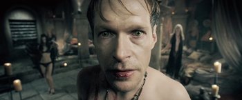 Movie still from “Underworld: Evolution” (2006), directed by Len Wiseman – A person with green eyes; Close Up shot, High angle