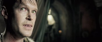 Movie still from “Underworld: Evolution” (2006), directed by Len Wiseman – A person wearing a fur coat; Close Up shot, Overhead angle