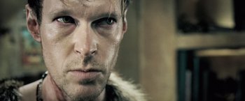 Movie still from “Underworld: Evolution” (2006), directed by Len Wiseman – A person wearing a fur coat; Extreme Close Up shot, Over the shoulder angle