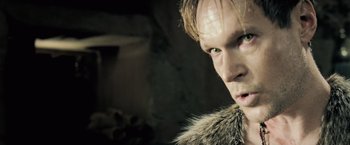 Movie still from “Underworld: Evolution” (2006), directed by Len Wiseman – A person wearing a fur coat; Close Up shot, Low angle