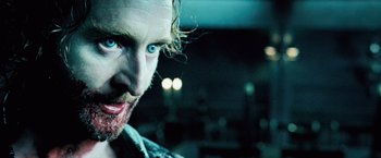 Movie still from “Underworld: Evolution” (2006), directed by Len Wiseman – A person with blue eyes; Close Up shot, Over the shoulder angle