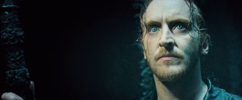 Movie still from “Underworld: Evolution” (2006), directed by Len Wiseman – A person with blue eyes; Close Up shot, Over the shoulder angle