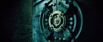 Movie still from “Underworld: Evolution” (2006), directed by Len Wiseman – View of the inside of an old bank vault; Extreme Close Up shot, Low angle