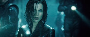 Movie still from “Underworld: Evolution” (2006), directed by Len Wiseman – A person wearing a wetsuit; Close Up shot, Low angle
