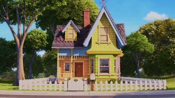 Movie still from “Up” (2009), directed by Bob Peterson – A cartoon style house with a picket fence and trees in the background; Extreme Wide shot, Low angle
