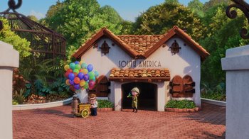 Movie still from “Up” (2009), directed by Bob Peterson – A group of people standing next to a building; Extreme Wide shot, High angle