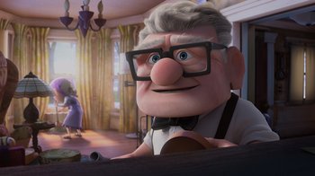 Movie still from “Up” (2009), directed by Bob Peterson – An old man with glasses and a mustache; Wide shot, Over the shoulder angle