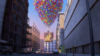 Movie still from “Up” (2009), directed by Bob Peterson – A bunch of balloons floating in the sky over a city; Extreme Wide shot, Low angle