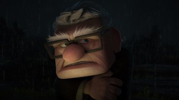 Movie still from “Up” (2009), directed by Bob Peterson – An old man wearing glasses and a jacket; Close Up shot, Low angle