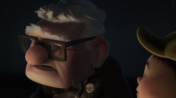 Movie still from “Up” (2009), directed by Bob Peterson – An old man wearing glasses and a jacket; Close Up shot, Over the shoulder angle
