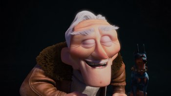 Movie still from “Up” (2009), directed by Bob Peterson – An old man with a white beard is smiling for the camera; Close Up shot, Low angle