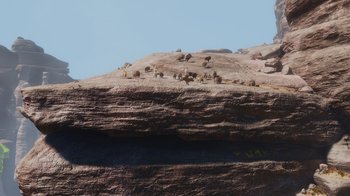Movie still from “Up” (2009), directed by Bob Peterson – A group of animals sitting on top of a rock formation; Extreme Wide shot, High angle