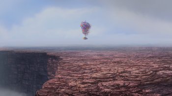 Movie still from “Up” (2009), directed by Bob Peterson – A hot - air balloon is flying over a cliff; Extreme Wide shot, High angle