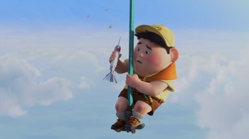 Movie still from “Up” (2009), directed by Bob Peterson – An animated character is holding a fishing rod; Medium shot, Low angle
