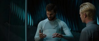 Movie still from “Upgrade” (2018), directed by Leigh Whannell – A man in a white shirt is standing in a tunnel; Close Up shot, High angle