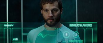 Movie still from “Upgrade” (2018), directed by Leigh Whannell – A man with a beard is looking at the camera; Close Up shot, Low angle