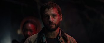 Movie still from “Upgrade” (2018), directed by Leigh Whannell – A person wearing a shirt; Close Up shot, Over the shoulder angle