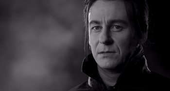 Movie still from “Van Helsing” (2004), directed by Stephen Sommers – Black and white photograph of a man in a black jacket; Close Up shot, Low angle