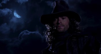 Movie still from “Van Helsing” (2004), directed by Stephen Sommers – A person wearing a hat; Close Up shot, Low angle