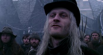 Movie still from “Van Helsing” (2004), directed by Stephen Sommers – A group of men standing next to each other; Close Up shot, Low angle