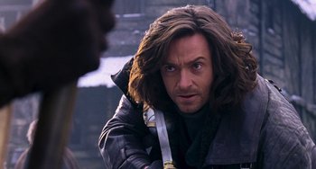 Movie still from “Van Helsing” (2004), directed by Stephen Sommers – A person with long brown hair; Close Up shot, Over the shoulder angle