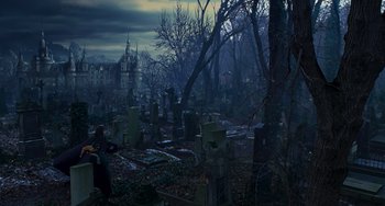 Movie still from “Van Helsing” (2004), directed by Stephen Sommers – A graveyard with a person standing in front of a tree; Extreme Wide shot, High angle