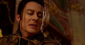 Movie still from “Van Helsing” (2004), directed by Stephen Sommers – A person with long brown hair; Close Up shot, Low angle