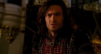 Movie still from “Van Helsing” (2004), directed by Stephen Sommers – A person with long hair; Close Up shot, Over the shoulder angle