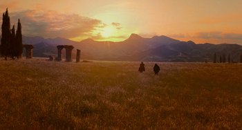 Movie still from “Van Helsing” (2004), directed by Stephen Sommers – A couple of people walking across a field; Extreme Wide shot, Low angle