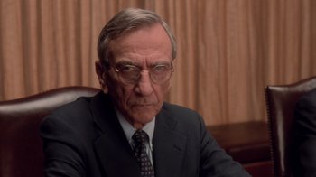 Movie still from “Vanilla Sky” (2001), directed by Cameron Crowe – An older man wearing a suit and tie; Close Up shot, High angle
