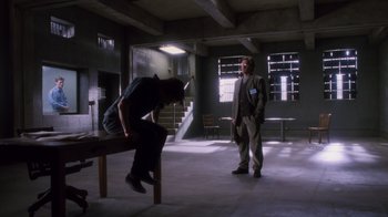 Movie still from “Vanilla Sky” (2001), directed by Cameron Crowe – A man and a woman are standing in an empty room; Wide shot, Low angle