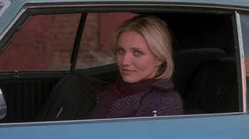 Movie still from “Vanilla Sky” (2001), directed by Cameron Crowe – A woman sitting in the passenger seat of a car; Close Up shot, High angle