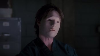 Movie still from “Vanilla Sky” (2001), directed by Cameron Crowe – A man with a white mask on his face; Close Up shot, High angle