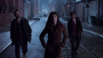 Movie still from “Vanilla Sky” (2001), directed by Cameron Crowe – Three people walking down a street at night; Wide shot, High angle