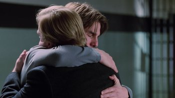 Movie still from “Vanilla Sky” (2001), directed by Cameron Crowe – Two people hugging each other in a room; Close Up shot, Over the shoulder angle