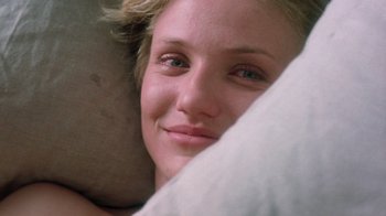 Movie still from “Vanilla Sky” (2001), directed by Cameron Crowe – A person laying in a bed with a pillow; Close Up shot, High angle